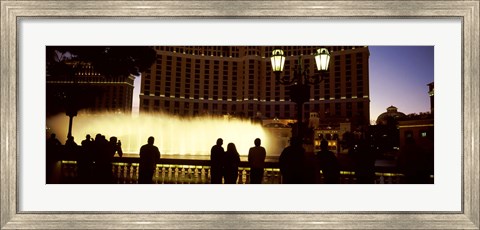 Framed Tourists looking at a fountain, Las Vegas, Clark County, Nevada, USA Print