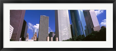 Framed Low angle view of buildings, Wedge Tower, Continental Airlines Tower, ExxonMobil Building, Chevron Building, Houston, Texas, USA Print