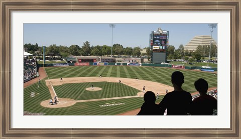 Framed Spectator watching a baseball match at stadium, Raley Field, West Sacramento, Yolo County, California, USA Print