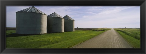 Framed Three silos in a field Print