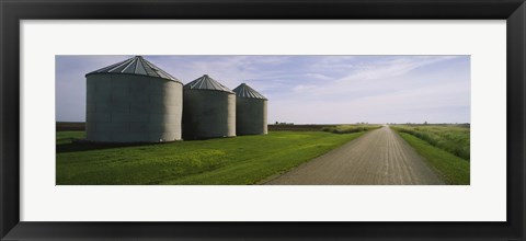 Framed Three silos in a field Print