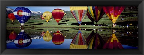 Framed Reflection of hot air balloons in a lake, Snowmass Village, Pitkin County, Colorado, USA Print