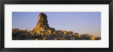 Framed Low angle view of a rock formation in a village, Cappadocia, Turkey Print