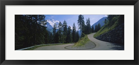 Framed Empty road passing through mountains, Bernese Oberland, Switzerland Print