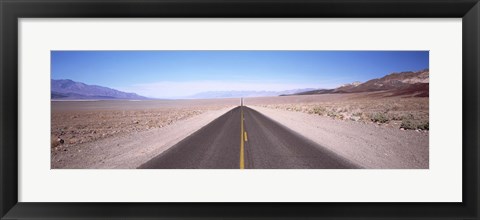 Framed USA, California, Death Valley, Empty highway in the valley Print