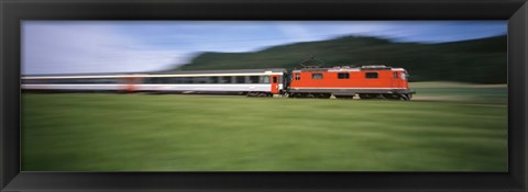 Framed Train moving on a railroad track Print