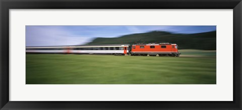 Framed Train moving on a railroad track Print