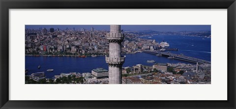 Framed Mid section view of a minaret with bridge across the bosphorus in the background, Istanbul, Turkey Print