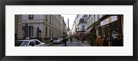 Framed Buildings along a street with a tower in the background, Rue Saint Dominique, Eiffel Tower, Paris, Ile-de-France, France Print