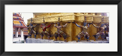 Framed Statues at base of golden chedi, The Grand Palace, Bangkok, Thailand Print