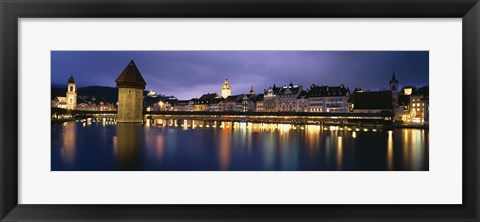 Framed Buildings lit up at dusk, Chapel Bridge, Reuss River, Lucerne, Switzerland Print