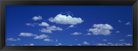 Framed Clouds against a deep blue sky Print