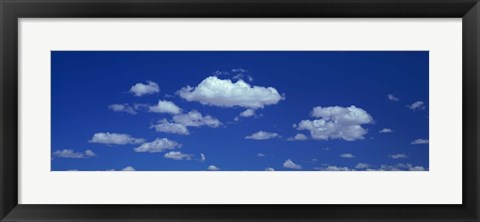 Framed Clouds against a deep blue sky Print