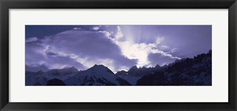 Framed Switzerland, Canton Glarus, View of clouds over snow covered peaks Print