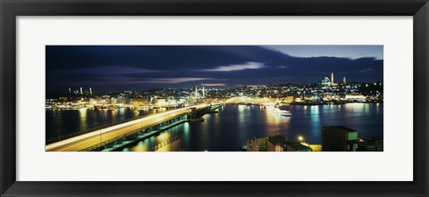 Framed High angle view of a bridge lit up at night, Istanbul, Turkey Print