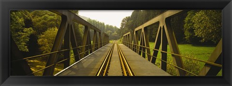 Framed Railroad tracks passing through a bridge, Germany Print