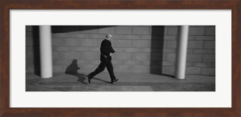 Framed Side Profile Of A Businessman Running With A Briefcase, Germany Print