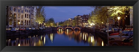 Framed Night View Along Canal Amsterdam The Netherlands Print