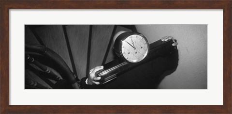 Framed Man Carrying Clock Up Stairs On Shoulders Print