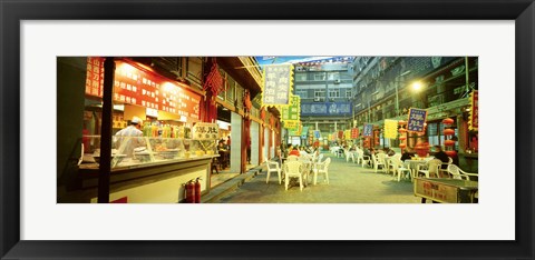 Framed Group of people sitting outside a restaurant, Beijing, China Print