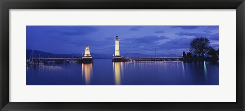 Framed Germany, Lindau, Reflection of Lighthouse in the lake Constance Print