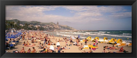 Framed Tourists on the beach, Sitges, Spain Print