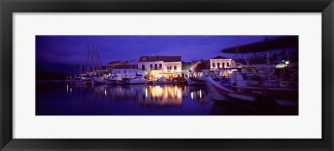 Framed Greece, Cephalonia, Light illuminated on harbor and outdoors cafe Print