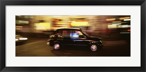 Framed England, London, Black cab in the night Print