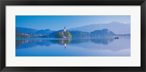 Framed Reflection of mountains and buildings in water, Lake Bled, Slovenia Print