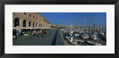 Framed Pedestrian walkway along a harbor, Barcelona, Catalonia, Spain Print