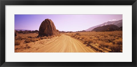 Framed Dirt road passing through an arid landscape, Californian Sierra Nevada, California, USA Print