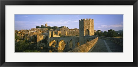 Framed Footbridge across a river in front of a city, Besalu, Catalonia, Spain Print