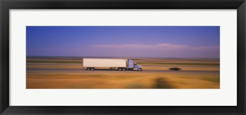 Framed Truck and a car moving on a highway, Highway 5, California, USA Print