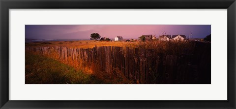 Framed Wooden fence in a field with houses in the background, Mendocino, California, USA Print