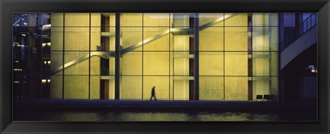 Framed Silhouette of a person walking in front of a building, Paul Lobe Haus, Berlin, Germany Print