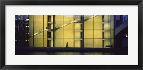 Framed Silhouette of a person walking in front of a building, Paul Lobe Haus, Berlin, Germany Print