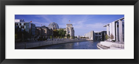 Framed Buildings along a river, The Reichstag, Spree River, Berlin, Germany Print