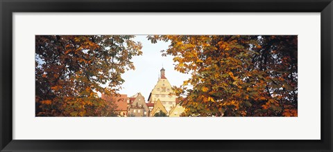 Framed Low angle view of buildings viewed through trees, Bietigheim, Baden-Wurttemberg, Germany Print