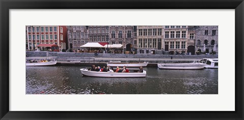 Framed High angle view of tourboats in a river, Leie River, Graslei, Ghent, Belgium Print