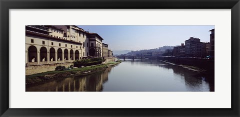 Framed Buildings along a river, Uffizi Museum, Ponte Vecchio, Arno River, Florence, Tuscany, Italy Print