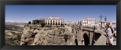 Framed Tourists standing on a bridge, Puente Nuevo, Ronda, Malaga Province, Andalusia, Spain Print