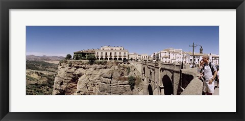 Framed Tourists standing on a bridge, Puente Nuevo, Ronda, Malaga Province, Andalusia, Spain Print