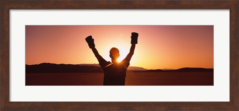 Framed Silhouette of a person wearing boxing gloves in a desert at dusk, Black Rock Desert, Nevada, USA Print