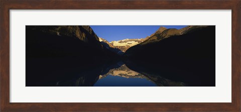 Framed Reflection of mountains in a lake, Lake Louise, Banff National Park, Alberta, Canada Print