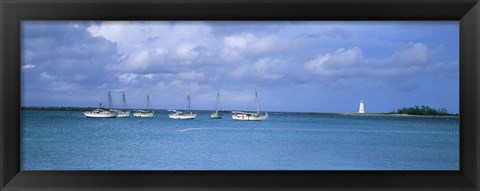 Framed Boats in the sea with a lighthouse in the background, Nassau Harbour Lighthouse, Nassau, Bahamas Print