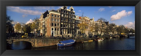 Framed Boats and Buildings along a canal, Amsterdam, Netherlands Print