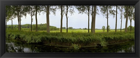 Framed Channel passing through a landscape from Brugge to Damme, Belgium Print