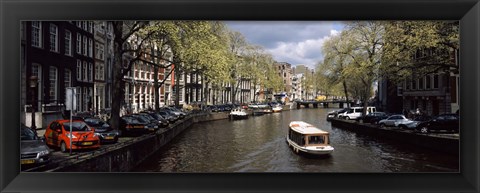 Framed Close up of Boats in a canal, Amsterdam, Netherlands Print