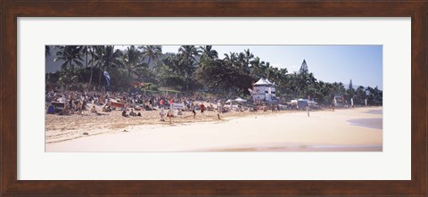 Framed Tourists on the beach, North Shore, Oahu, Hawaii, USA Print