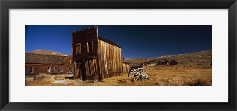 Framed Abandoned buildings on a landscape, Bodie Ghost Town, California, USA Print